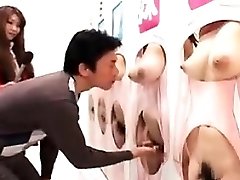 Two wild Asian chicks take turns on a hard fuck-stick and share a