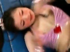 Sexy Japanese honies wrestle each other to rip off their cl