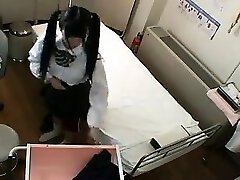 Nice Asian schoolgirl with pigtails has a doctor fingering 