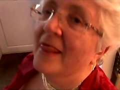 Grandmother with massive boobs stripping and spreading