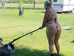 Got back to find wife mowing in a g-string swimsuit, her ass and thighs shaking with every step 