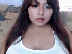 Mexican chubby gal licking her boobs