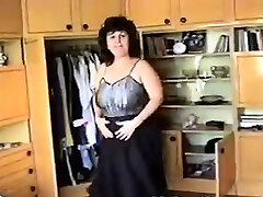adorable milf getting dressed