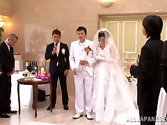 Chinese bride gets drilled by a few men after the ceremony
