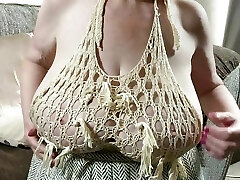 Mature Sally's hefty tits in a poor top which leaves nothing to the imagination