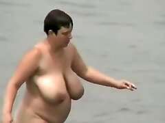 Huge-chested and fat mature nudist