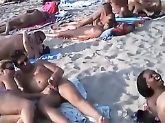 Blowjobs  and sex on a nudist beach