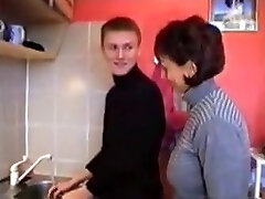 Russian mummy Amalia with her boy in kitchen