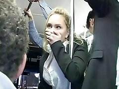 Blonde caressed to orgasm on bus