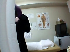 Hidden spy cam massage turns into fingering a gal's cooch