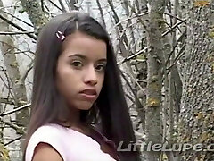 Little Lupe masturbates her tight pussy in the forest