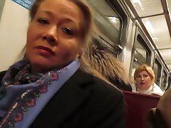 girl flashing fishnet stockings in a train