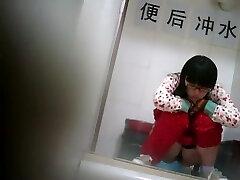 Geeky chinese girl spied while urinating