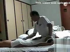 My nude wife gets massage from an Asian man