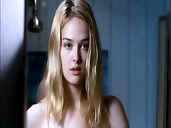Jess Weixler bare lying on her back as a boy squeezes and
