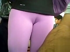 Spandex chick on the train has supreme cameltoe