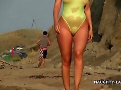 Sheer swimsuit and nude on the beach