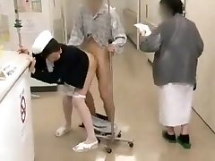 Dutiful Japanese Nurse Services Patient in Public Hospital.