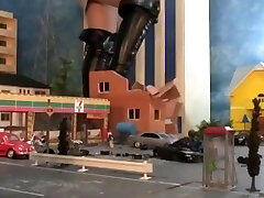 sexy giantess stomping city in high stilettos and boots