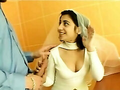 Sexy black-haired indian bride talking with a guy