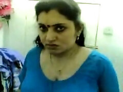 Cute and obese Indian wifey taunted on the bed in front of cam