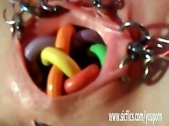 Immensely bizarre pierced vaginal insertions