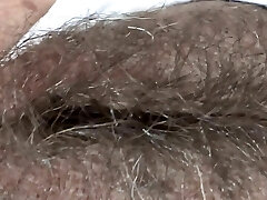 While I rest at the hotel on the beach, my manager films my big hairy pussy
