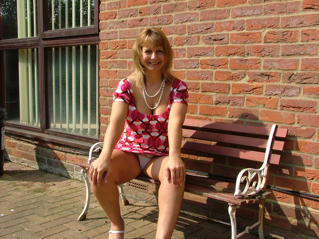 Wife Sitting Upskirt - British milf wife outside in upskirt