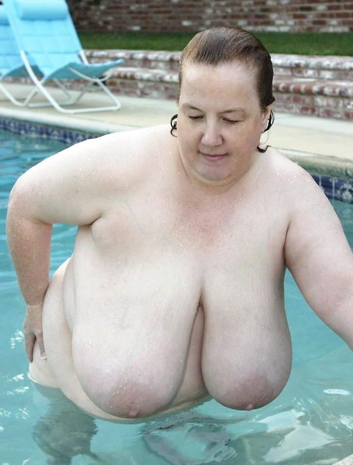 Fat Swimming - Fat mature nudist women swimming in a pool
