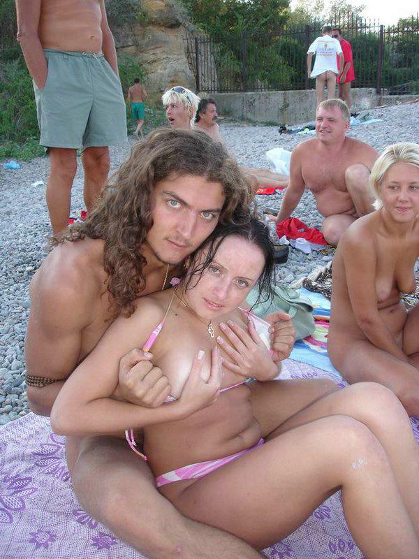 Naked Friends Nudist - Nude teen friends play around at a public beach
