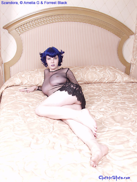 blue haired goth in see through lace dress