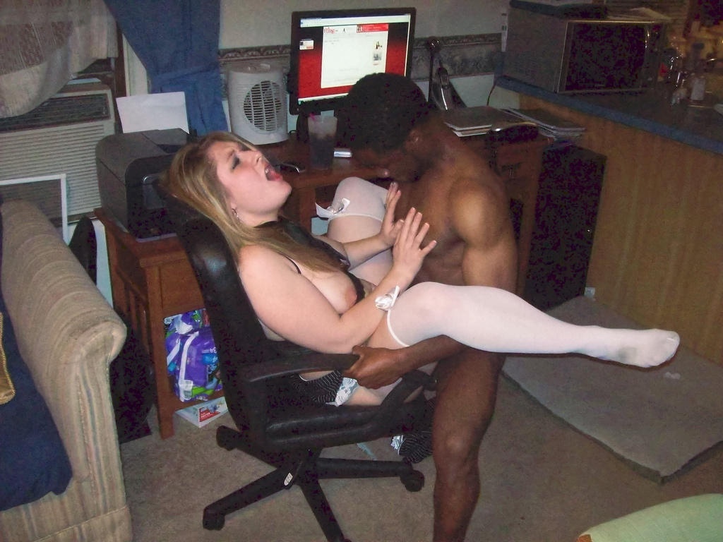 Busty slut spreads wide for big black cock.Interracial photo