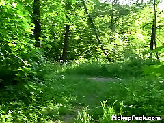 Sex-starved girl blows two cocks in the woods