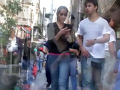 Hot ass in tight jeans swaying in front of a candid cam