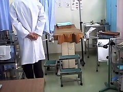 Japanese hottie exposed in a medical exam voyeur video