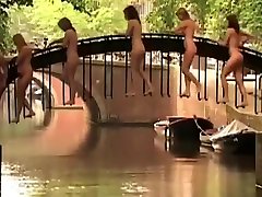 Nude women on an amazing bridge for a great picture