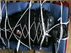 In the leather bodybag, slave gets a CBT by NeonWand