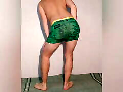 Hot guy tries on green boxers change cloces poses sexy in them