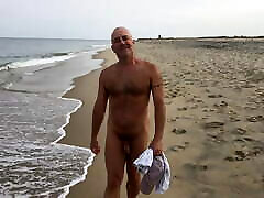 Public nude beach stroll with bending over