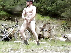 Muscle stud gets nelofer afgani on a bike ride, flexes muscles lifts huge logs and cums old vid