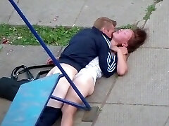 Drunk couple poke on the playground